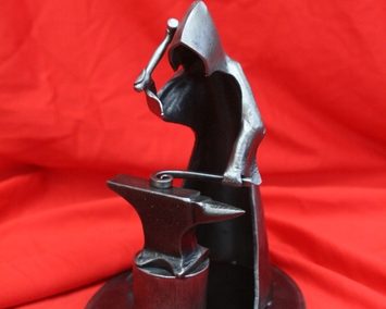 Blacksmith Monk Sculpture